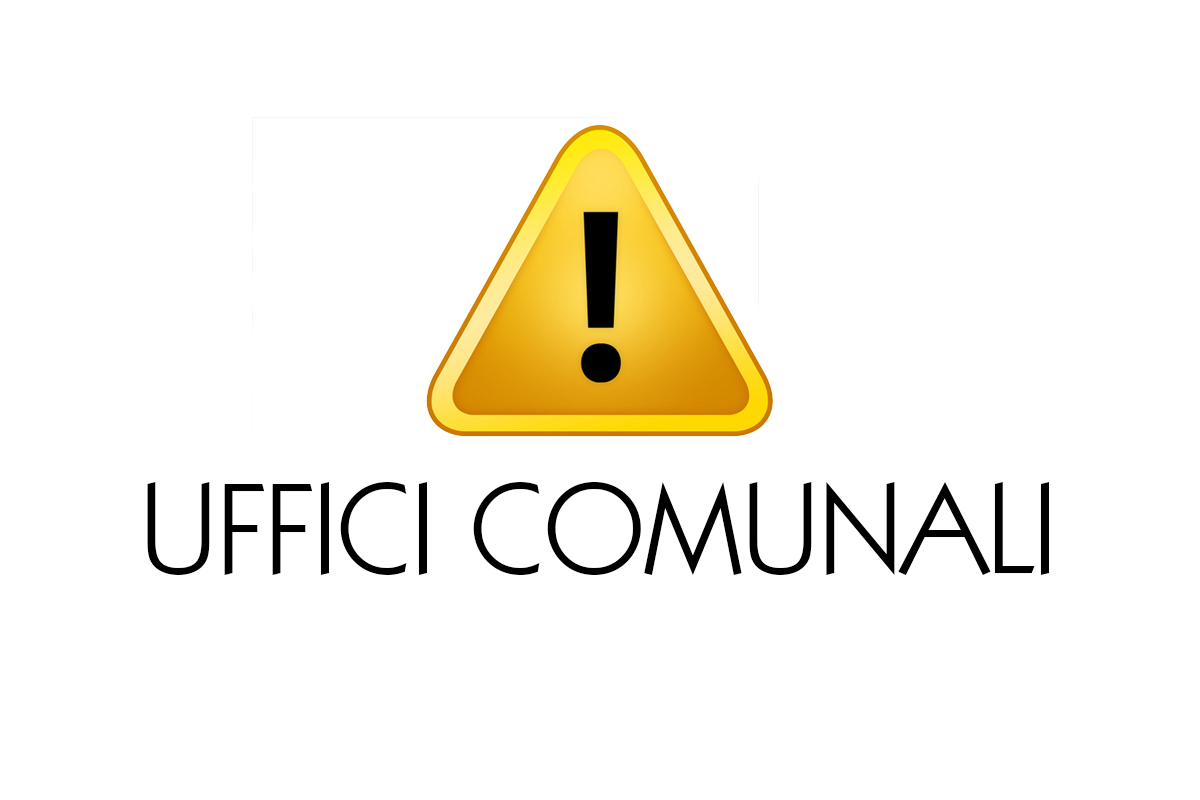 Su sfondo bianco un segnale triangolare giallo con al centro un punto esclamativo nero e sotto la scritta in stampatello maiuscolo nero "Uffici Comunali".