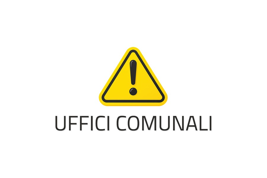 Su sfondo bianco un segnale di pericolo giallo con un punto esclamativo nero al centro e la scritta in nero "Uffici Comunali"